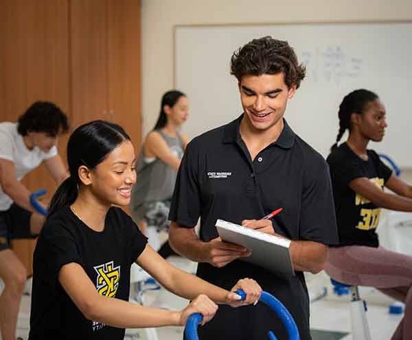 ksu students performing health assessments using treadmill